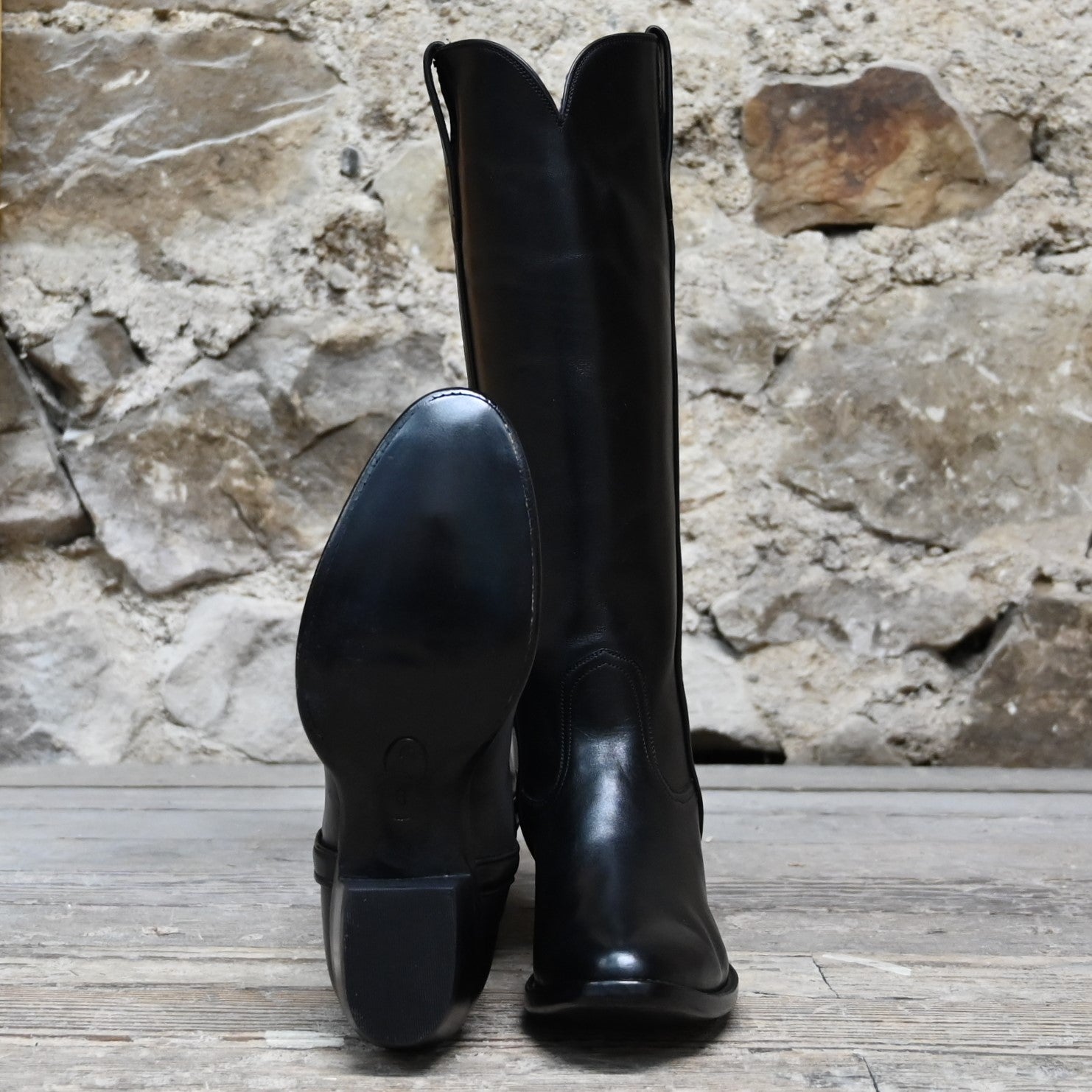 View of Stallion Ladies 16" boots showcasing black French calf vamp and top with B toe and leather stacked heel