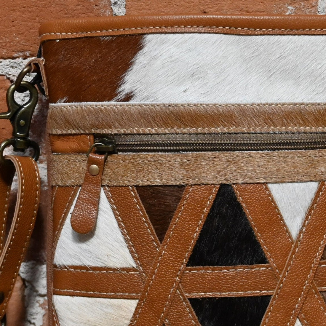 Myra Dakota Plains Hair on and Canvas Cross Body Bag with Criss Cross Accents view of close up