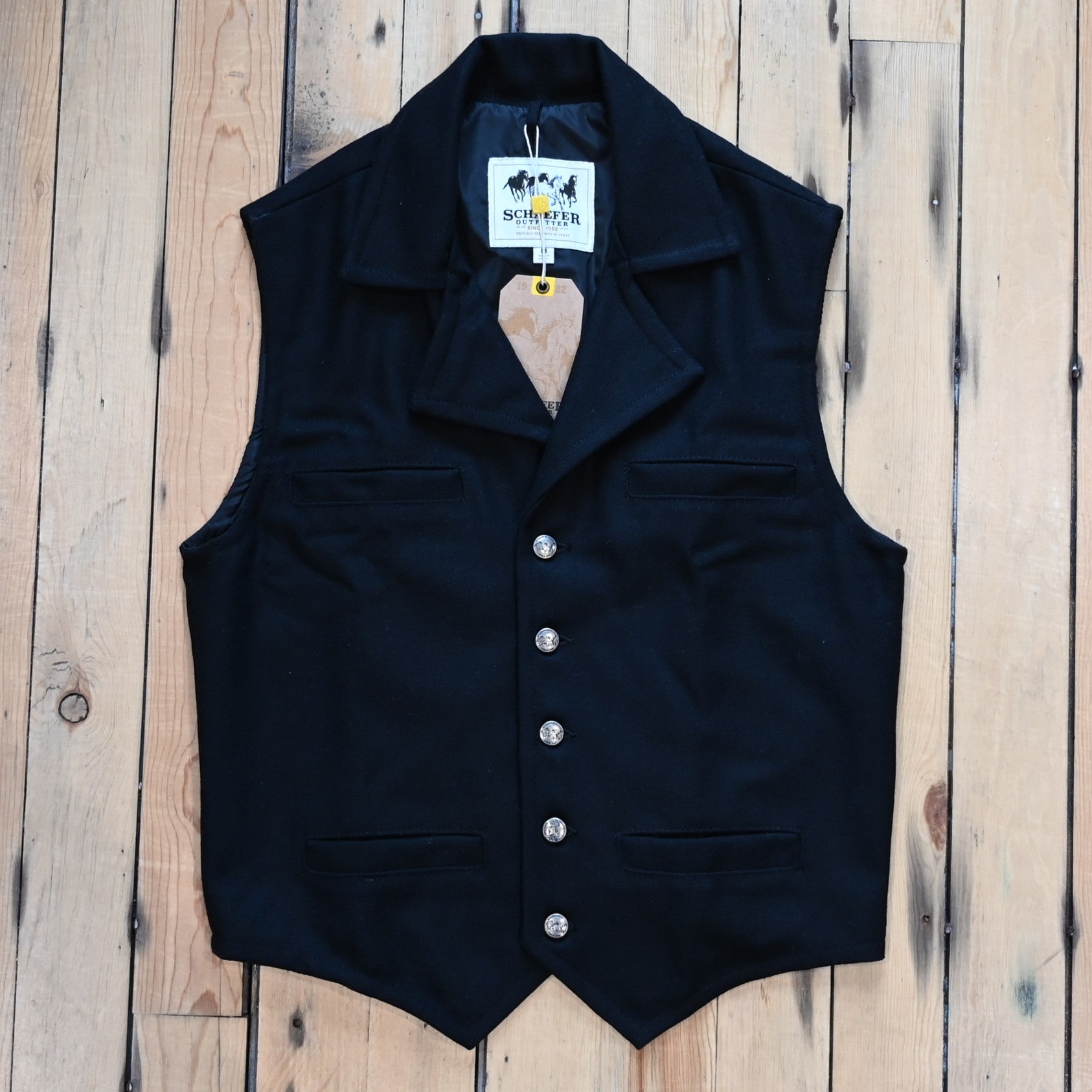 Schaefer Cattle Baron black wool vest with four pockets and tailored Western fit