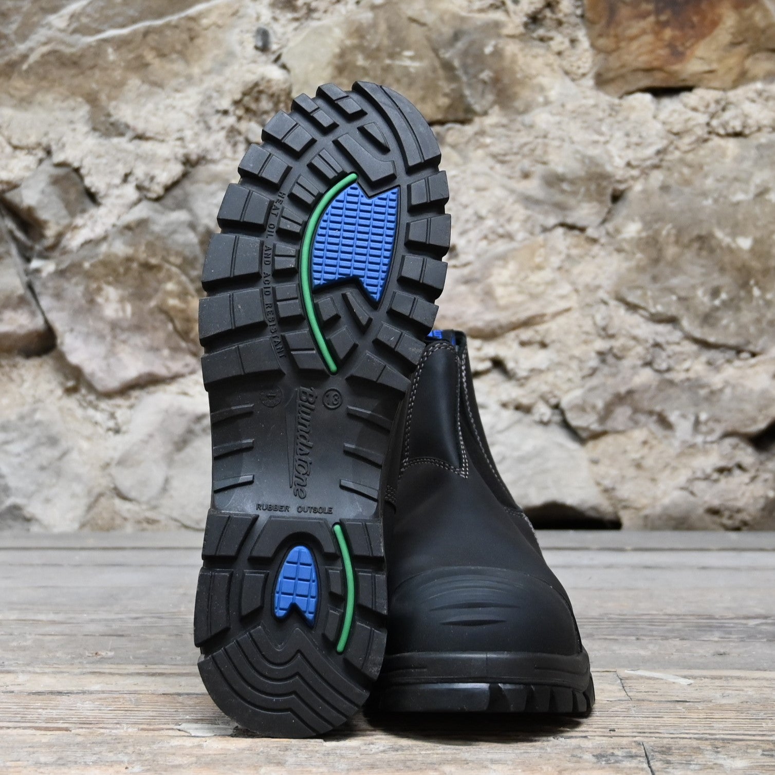 Blundstone Slip On work boot in black leather with steel toe, elastic sides, and safety-rated outsole