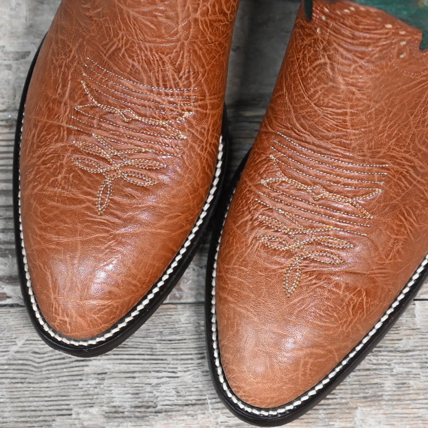View of Hondo 14" cowboy boot with green volcano top, habana shoulder vamp, and tight round toe
