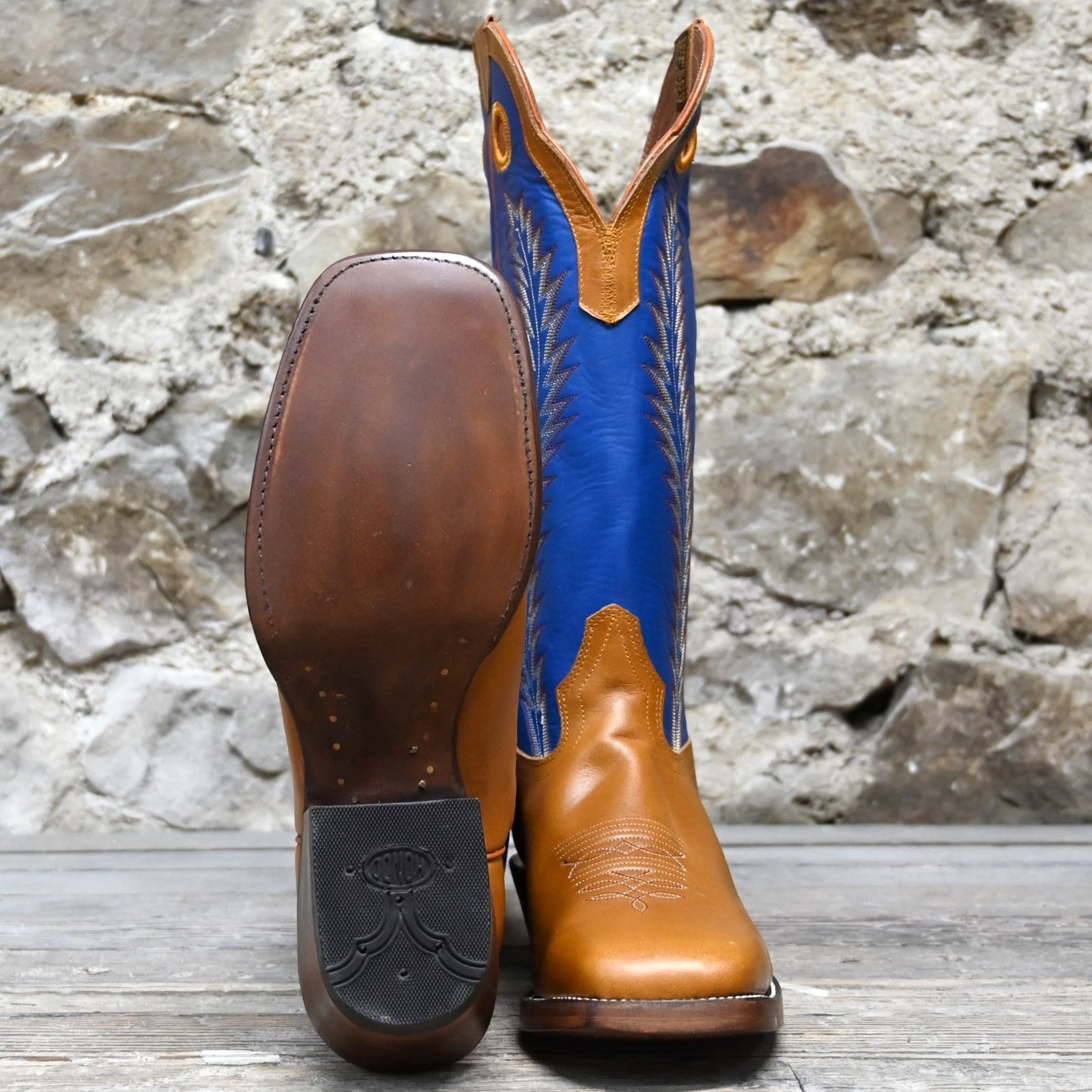 View of Hondo 16" cowboy boot with blue top, honey crazy horse vamp, wide square toe, and spur ledge