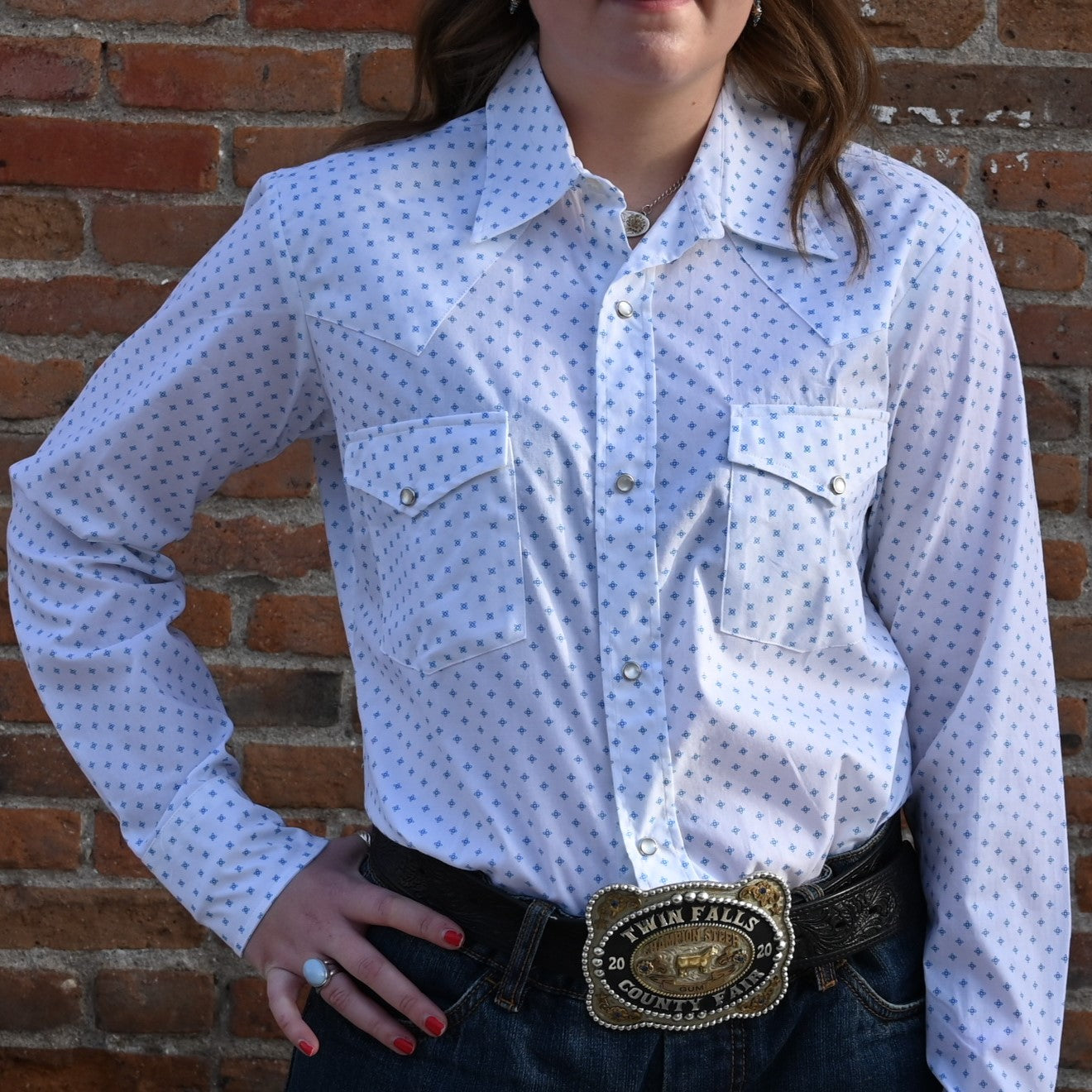 View of Blue Blanket ladies blue star western shirt with pearl snaps and bold motif