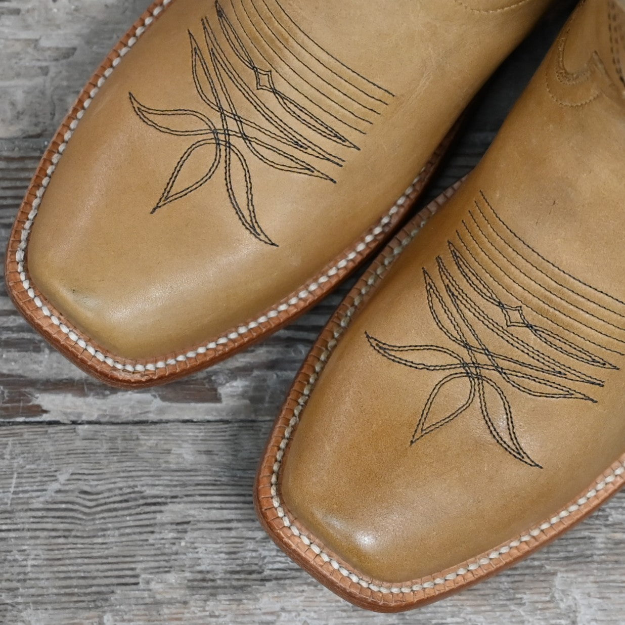 View of Hyer MAIZE 13" boots showcasing Sunrise Retan cowhide vamp and top with Cutter toe and leather stacked heel