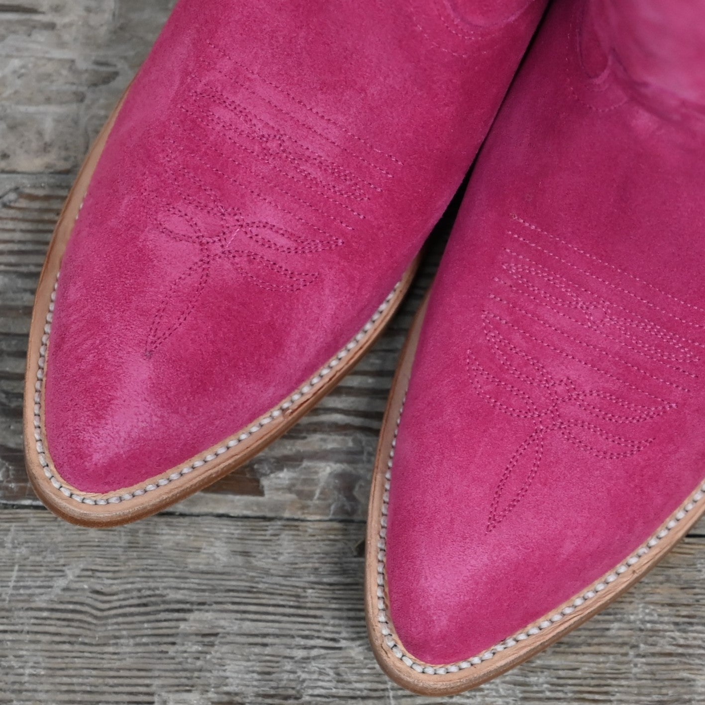 View of Macie Bean 15" hot pink suede boot with almond toe and Citygirl heel