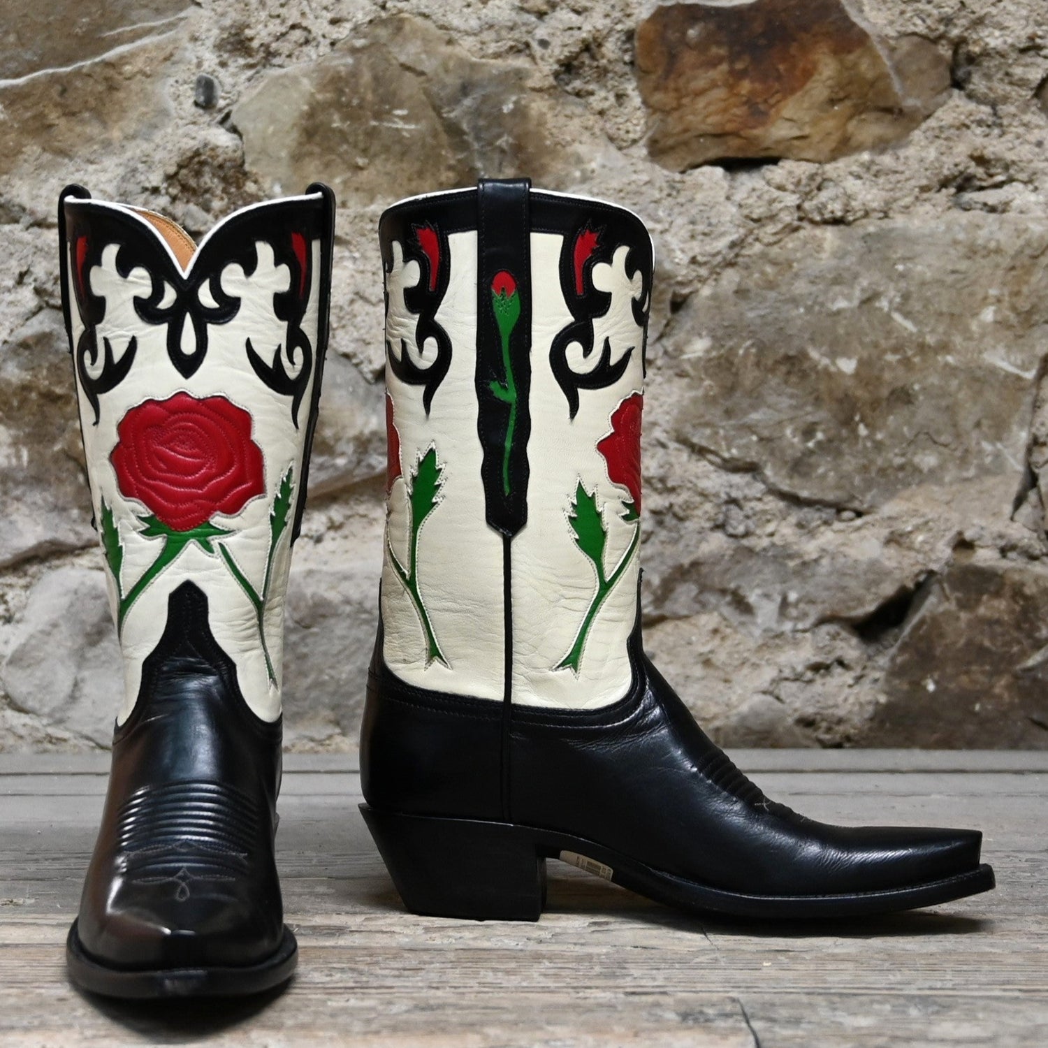 View of Lucchese ladies 13″ boot in black and wheat with red rose inlay and vintage collar