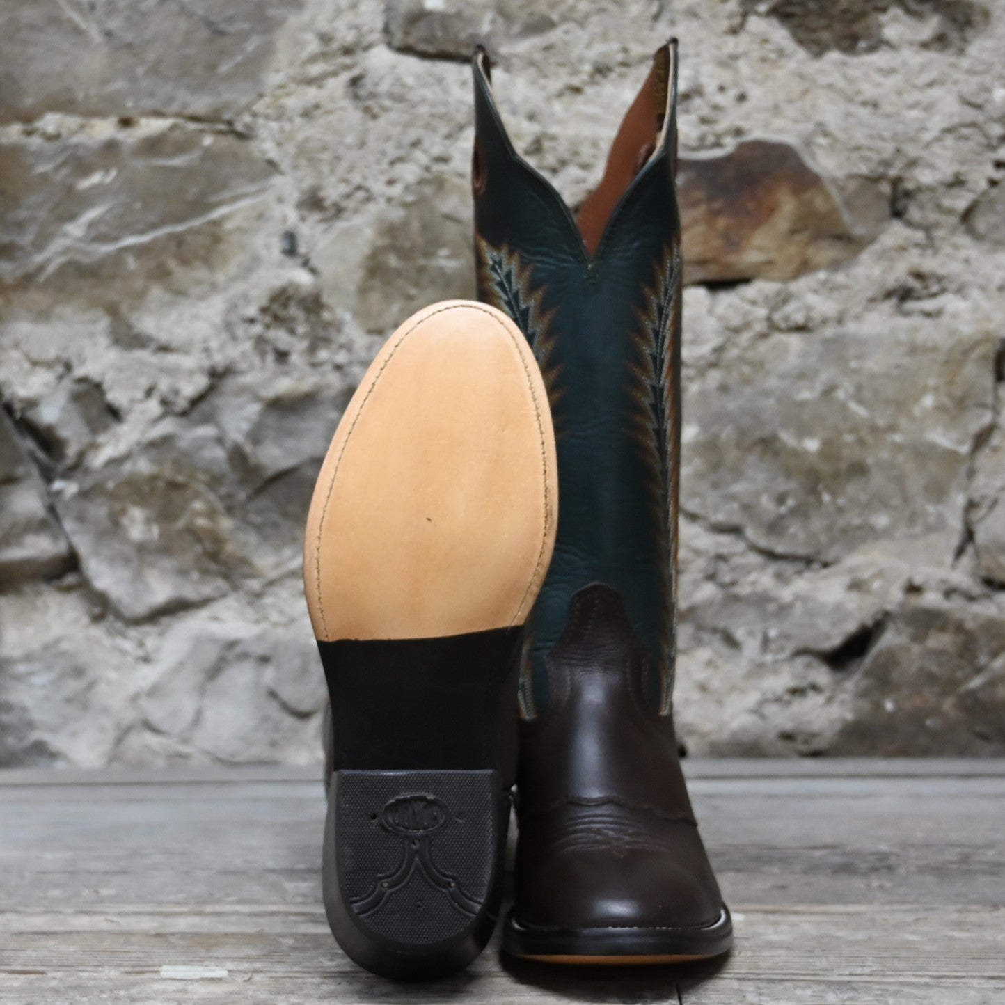 View of Hondo 16" cowboy boot with forest green retan-lined top, brown retan vamp, medium round toe, and spur ledge