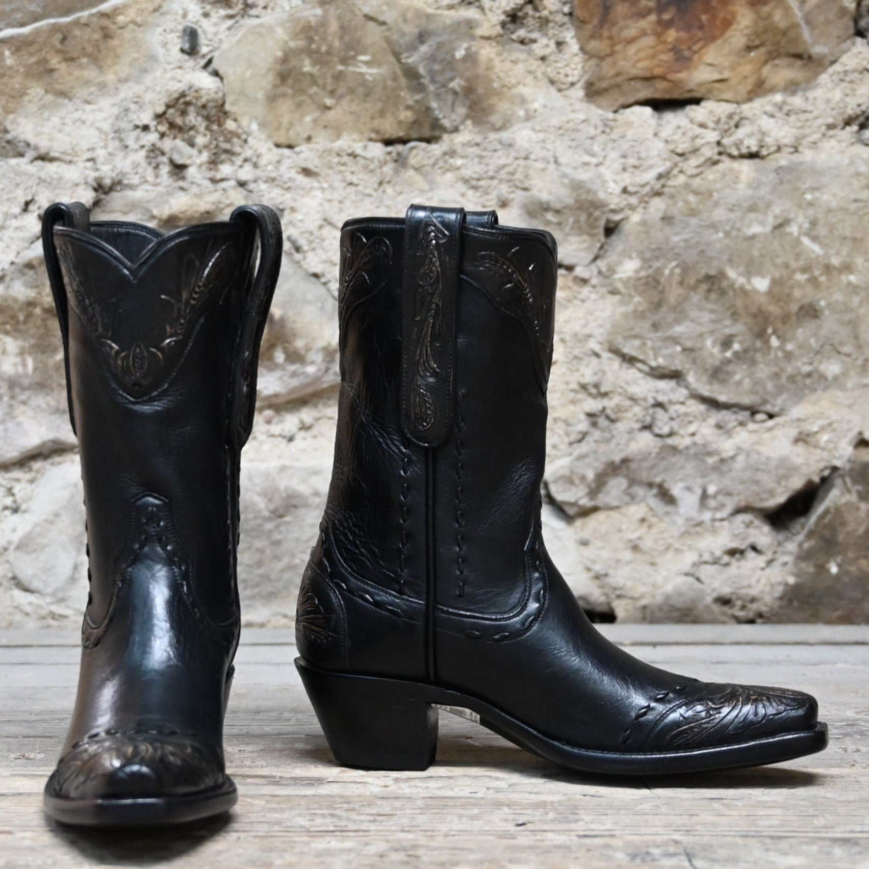 View of Stallion Ladies 10" Black Ranch Hand Boot with tooled top, whipstitch, and buck lacing