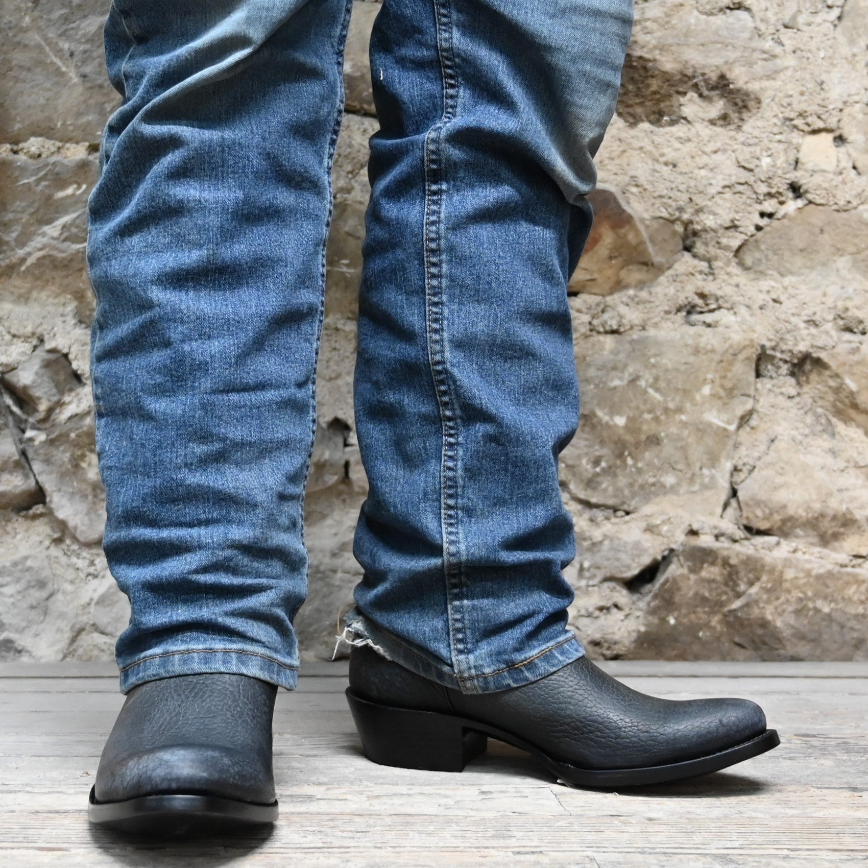 Nutted Calf Black Bison "The Man in Black" Town Boot on Custom "Duke" Last view of front and side on model