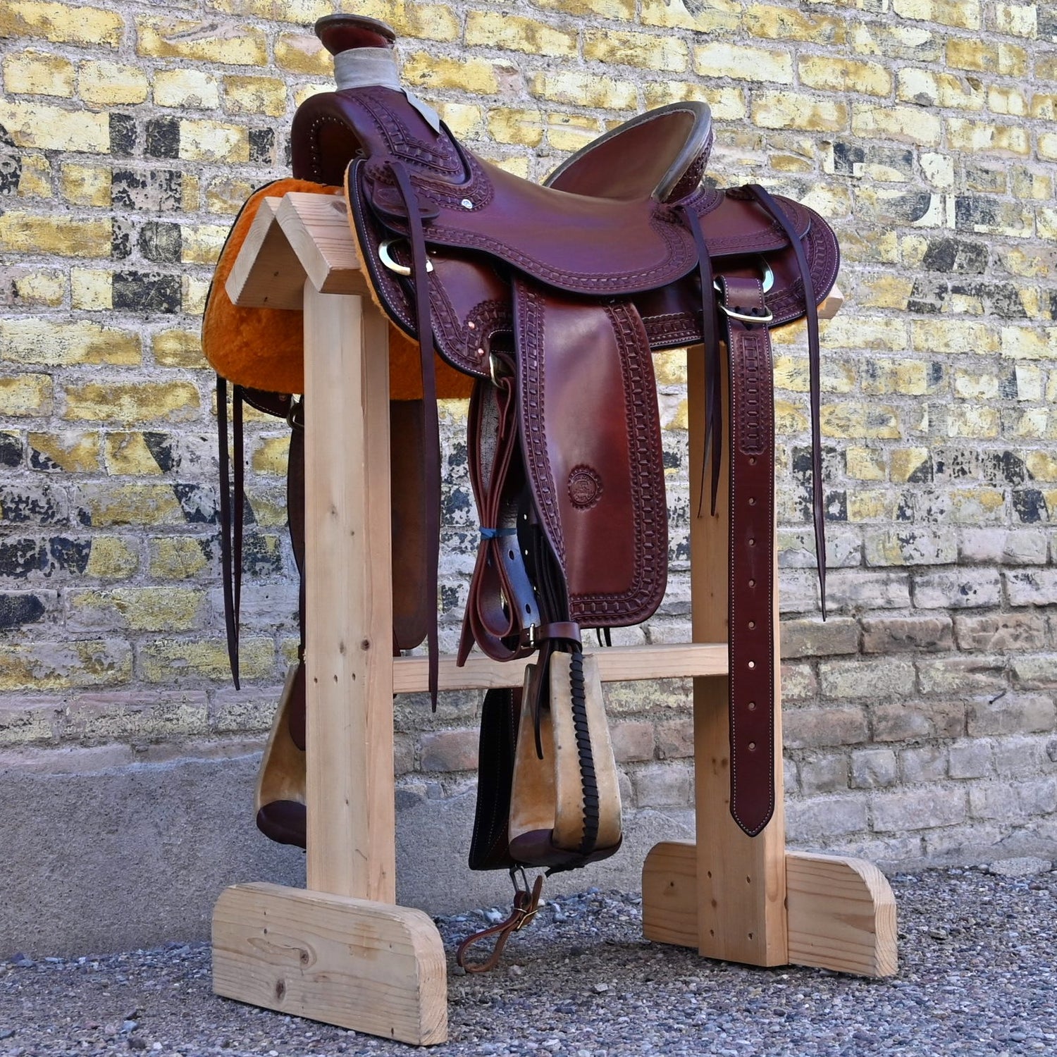 View of Billy Cook 15½" Arbuckle Wade Saddle with waffle border tooling and 7/8 in-skirt rigging