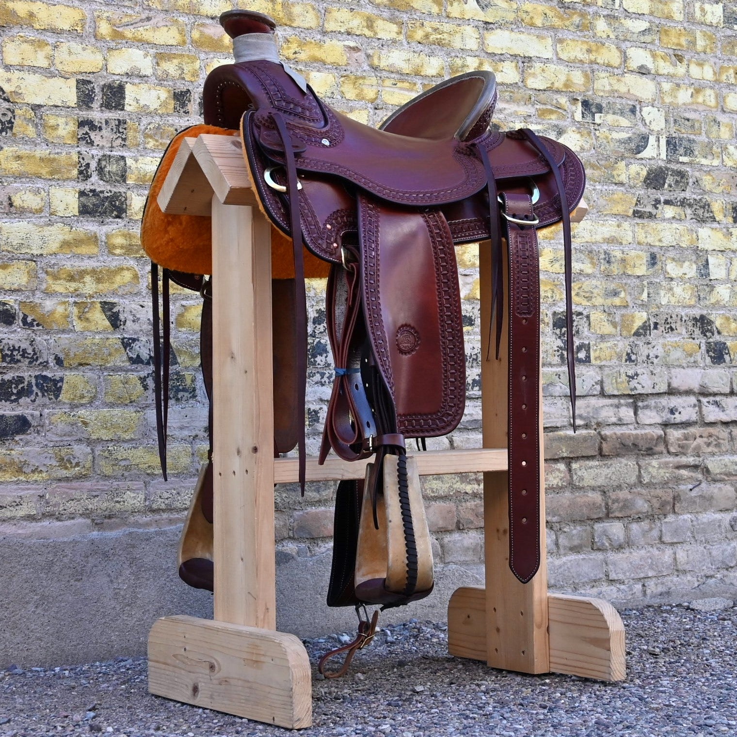 View of Billy Cook 15½" Arbuckle Wade Saddle with waffle border tooling and 7/8 in-skirt rigging