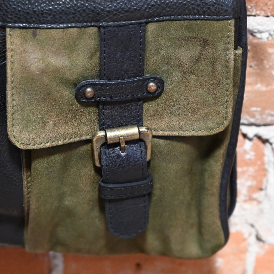 Latico Gypsy Crossbody with multiple outside pockets in Brown and Olive close up view