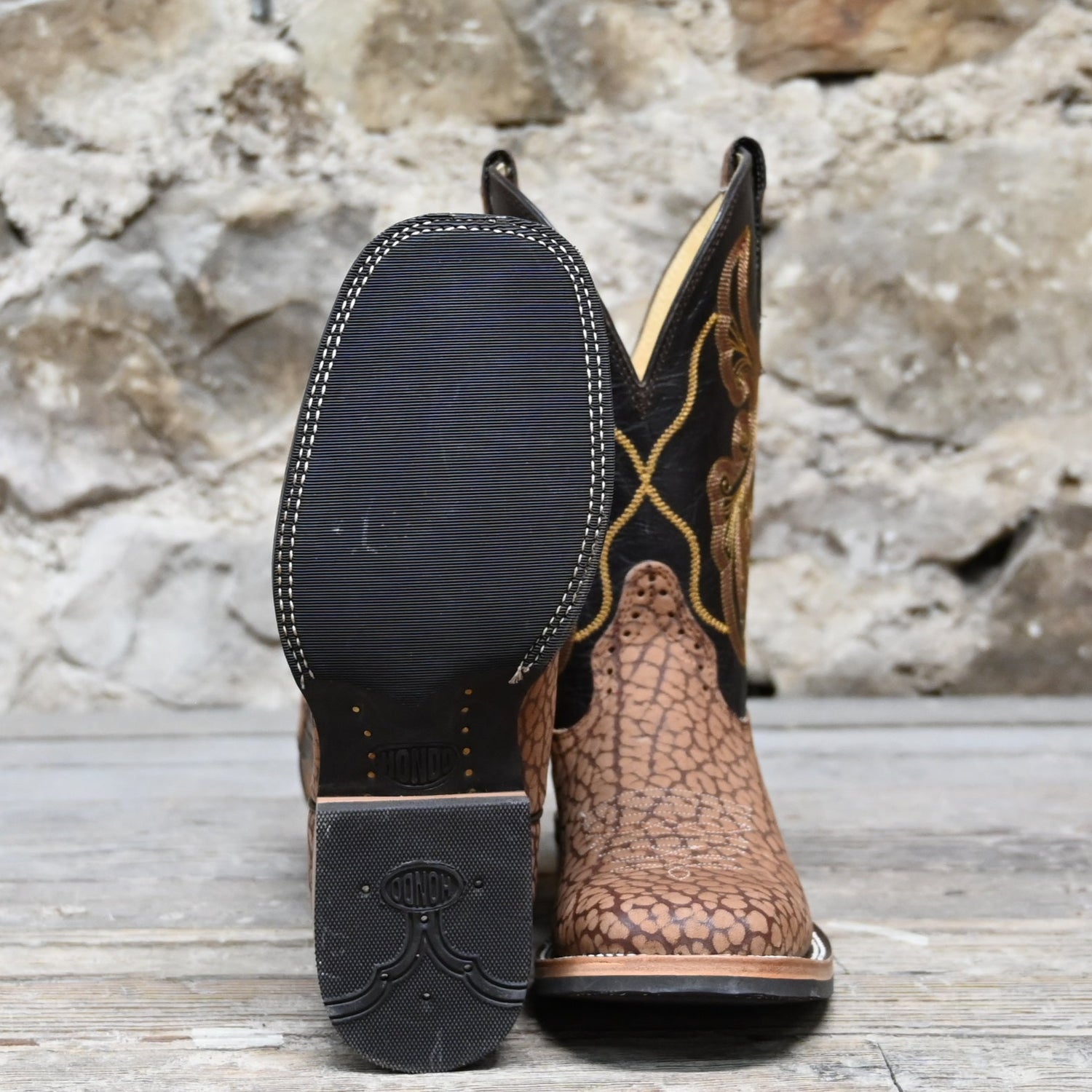 View of Hondo 11" cowboy boot with sand nubuck bullhide vamp, brown volcano top, and wide square toe