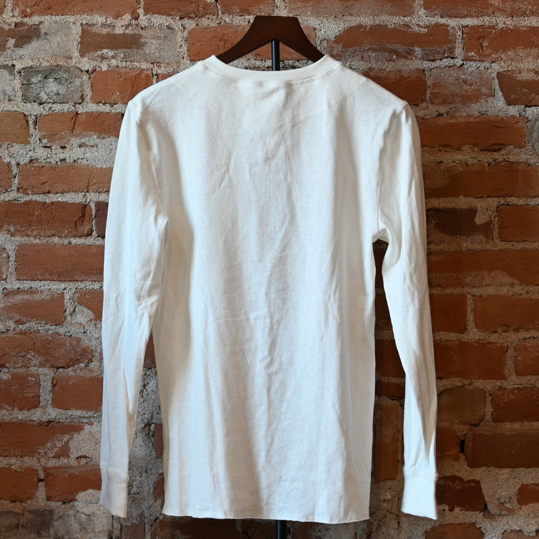 Howl Intentional Goods Unisex Quetico Henley in natural hemp and cotton blend with mother-of-pearl buttons