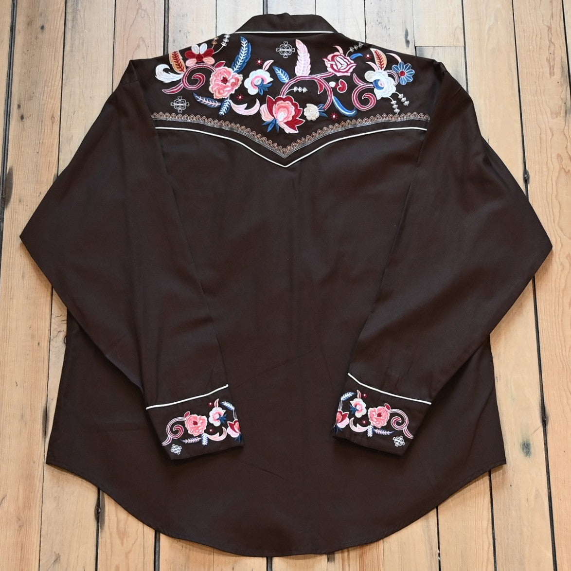 View of Brown Western shirt with tonal floral embroidery and Western smile pockets