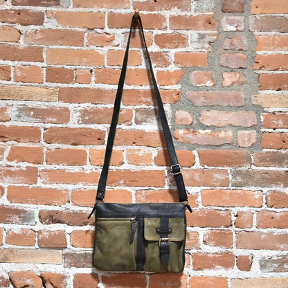 Latico Gypsy Crossbody with multiple outside pockets in Brown and Olive hanging view
