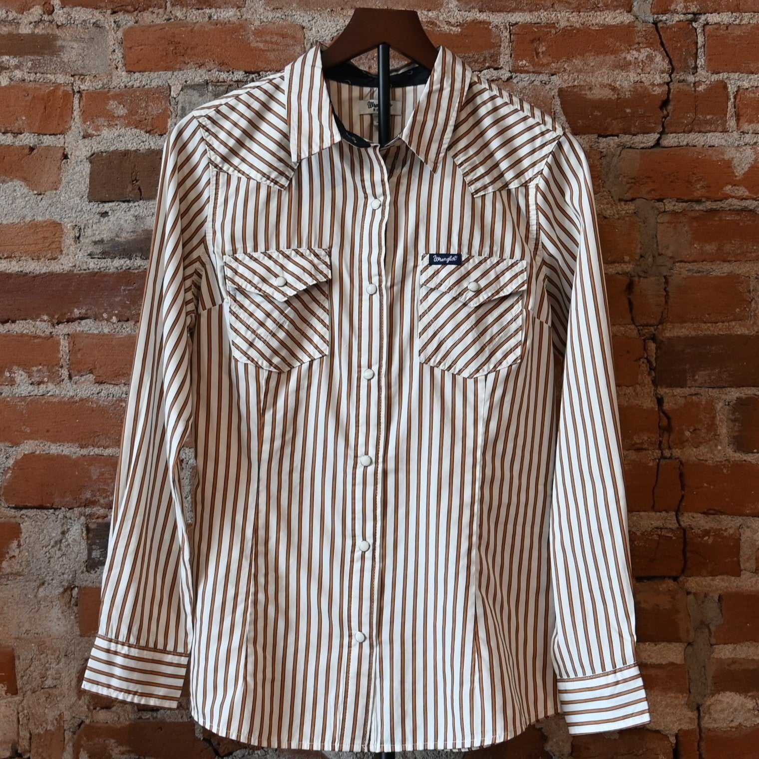 Wrangler Ladies All Occasion Western Snap Shirt in rust stripes with pearl snaps and chest pockets