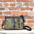 Latico Gypsy Crossbody with multiple outside pockets in Brown and Olive view of front