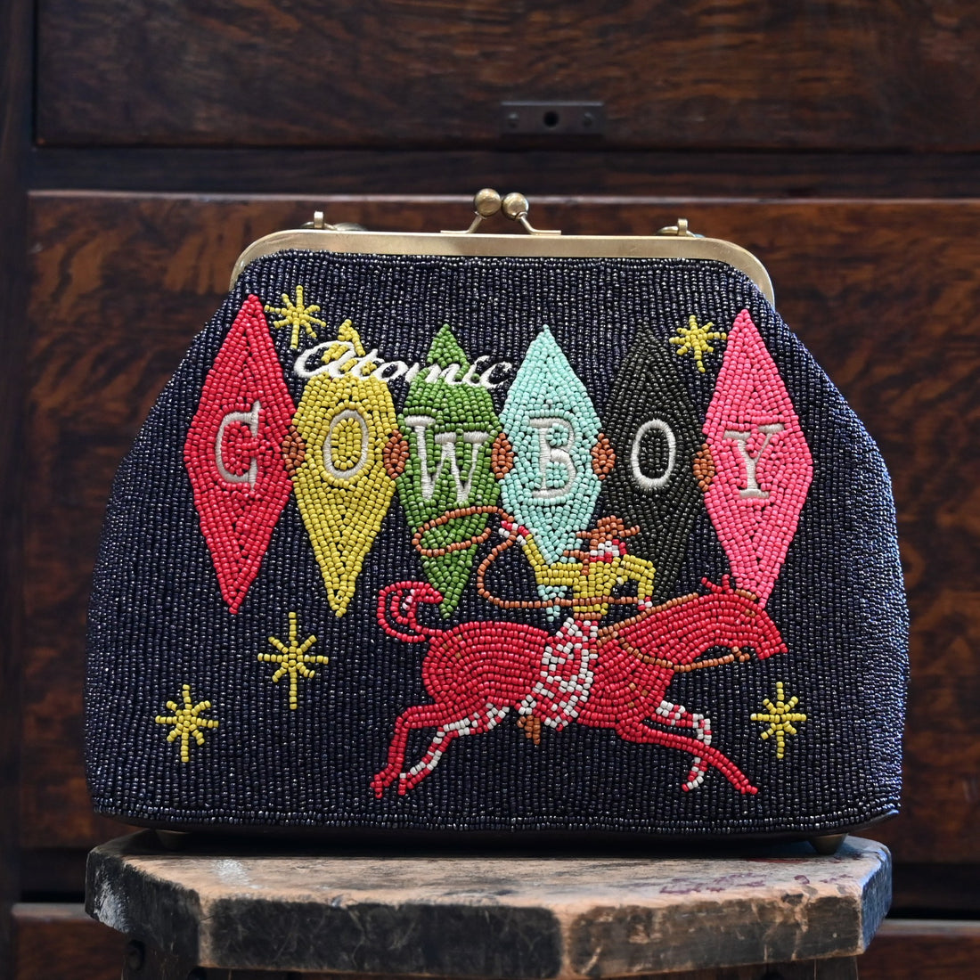View of Beaded handbag in Atomic Ranch colors with tortoise shell lucite handle