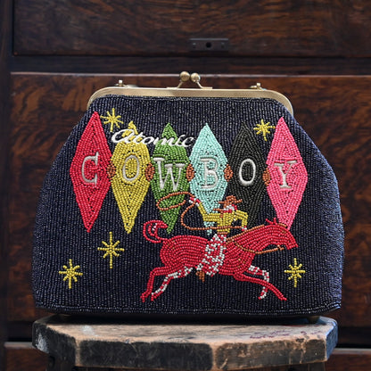 View of Beaded handbag in Atomic Ranch colors with tortoise shell lucite handle
