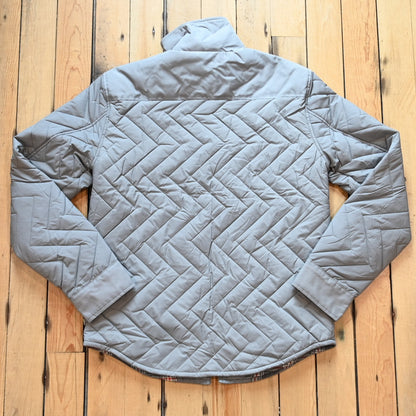 Kimes Ranch men’s Skink quilted jacket with zig-zag pattern, chest flap pockets, and longhorn embroidery