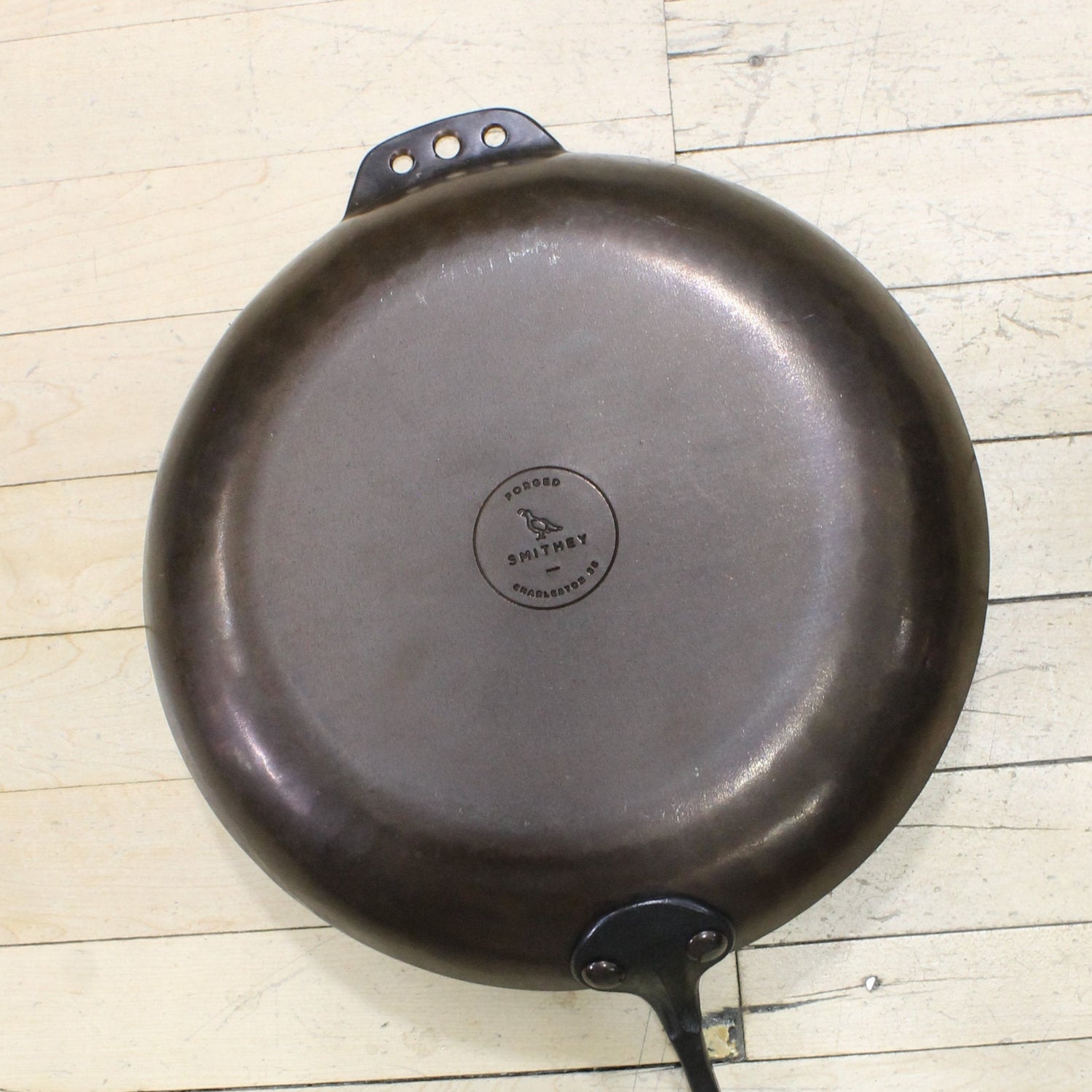 Smithey 12in Carbon Steel Farmhouse Skillet view of bottom of skillet