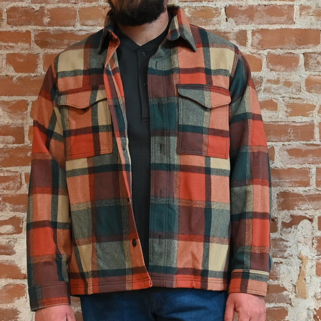 Filson Seattle wool jac-shirt in amber spruce plaid with button front and chest pockets