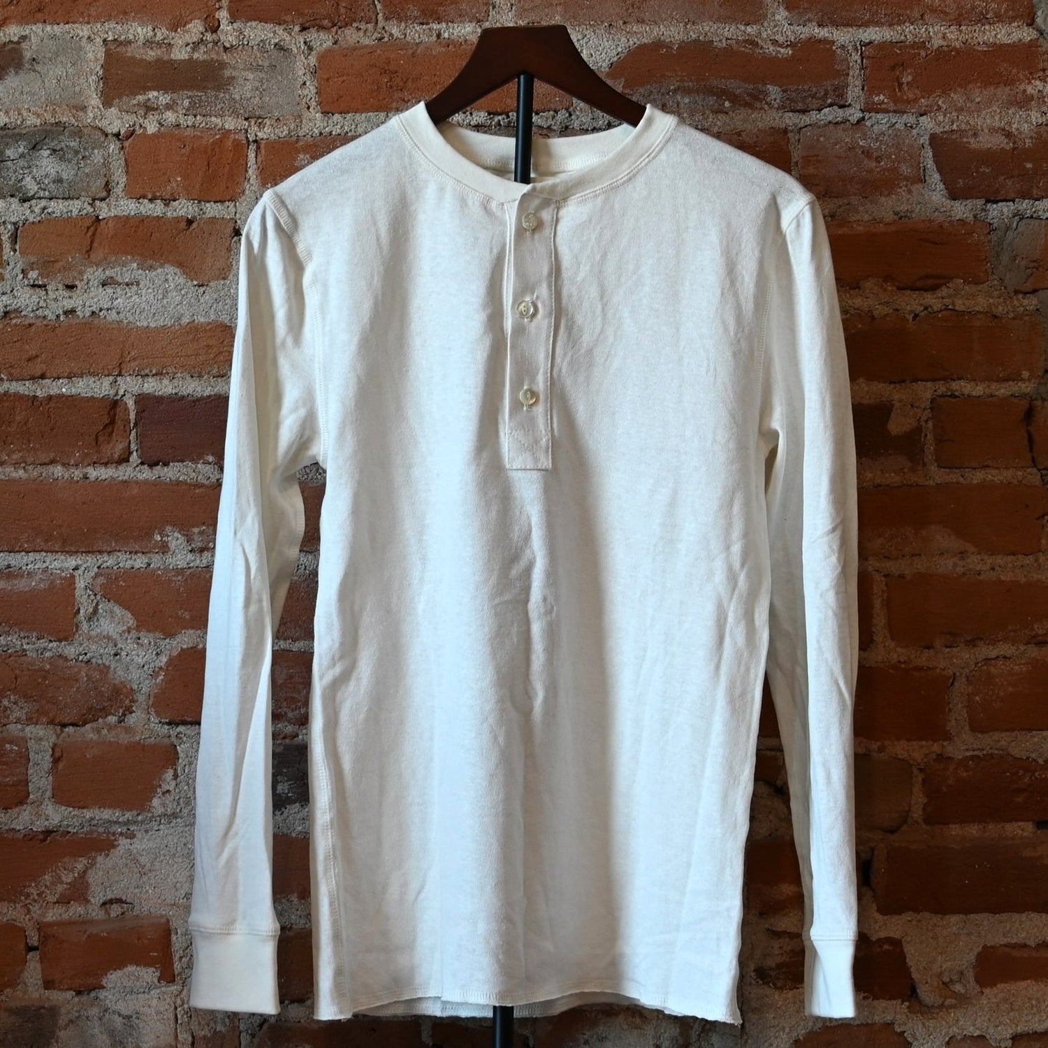 Howl Intentional Goods Unisex Quetico Henley in natural hemp and cotton blend with mother-of-pearl buttons