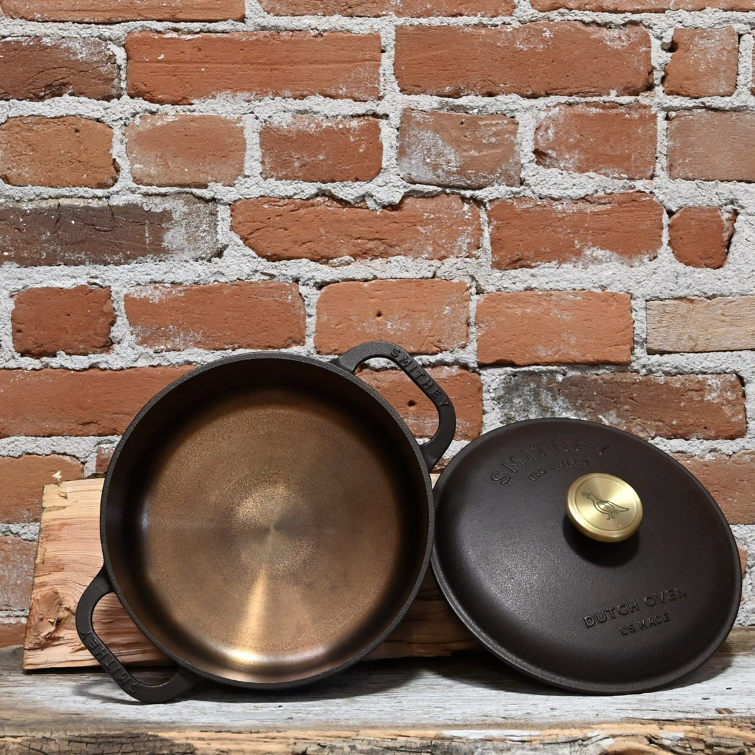 View of Smithey 3.5 Qt Cast Iron Dutch Oven with polished interior and brass knob