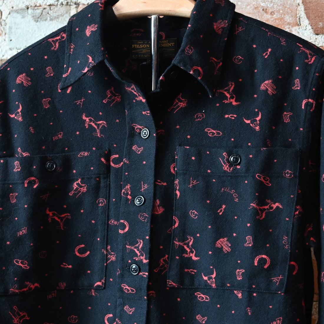 Filson ladies Rangeland flannel shirt in black with pink Western detail, spread collar, chest pockets