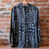 View of Johnny Was multicolor velvet shirt with floral embroidery on back