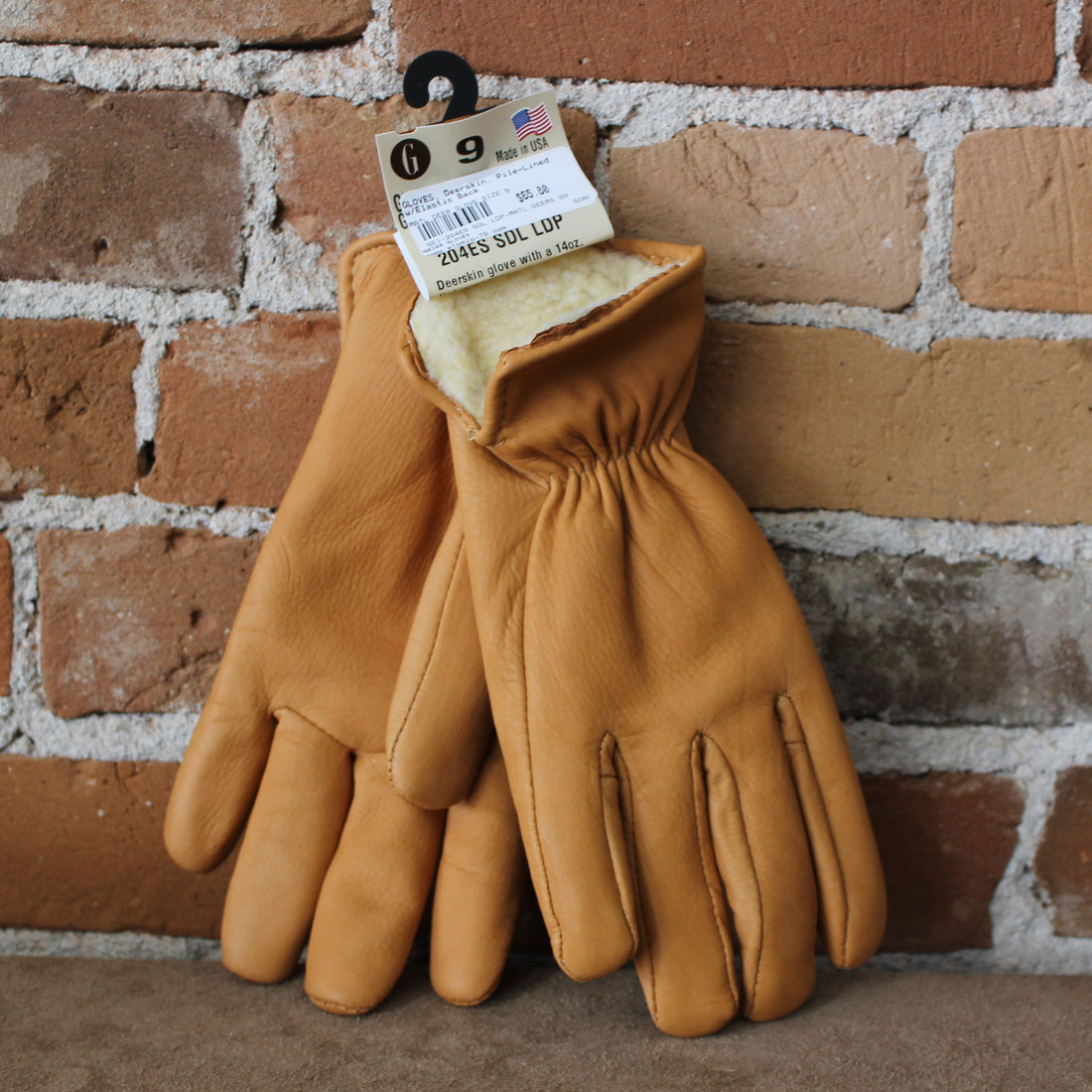 Pile-lined Deerskin Gloves In Saddle Brown W/Elastic Back view of gloves