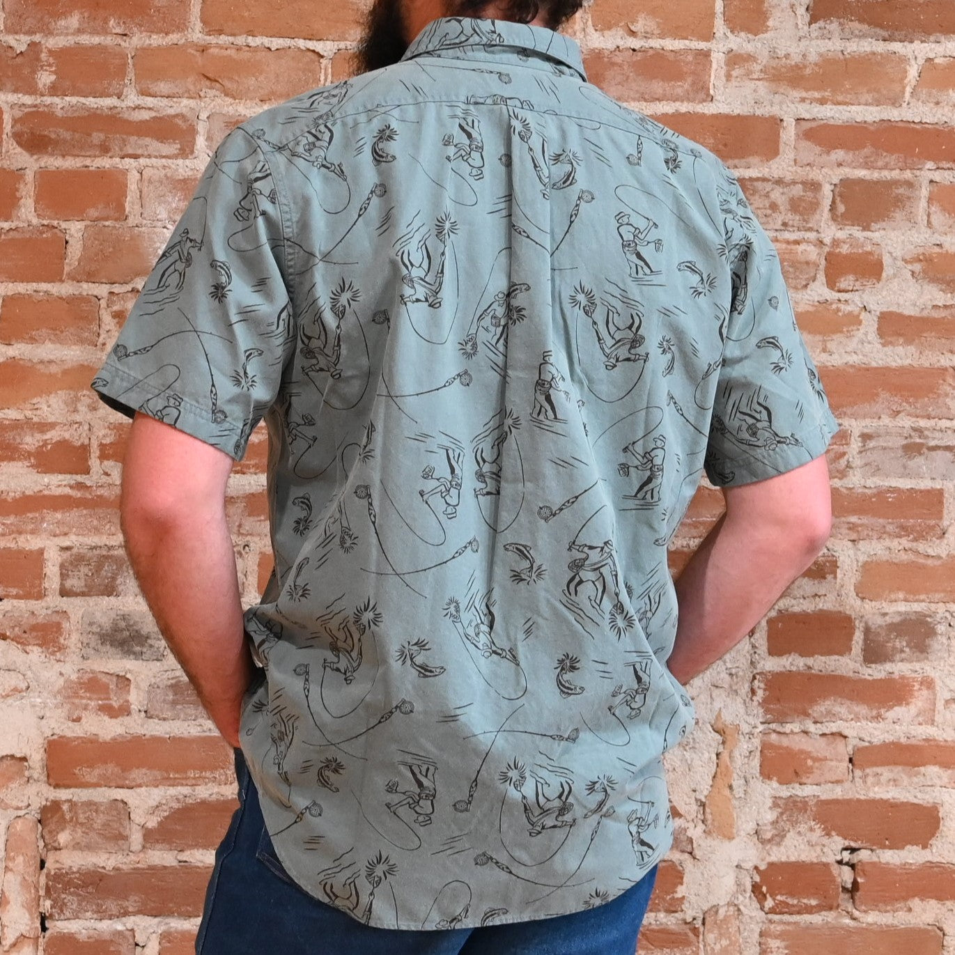 View of back of shirt in blue