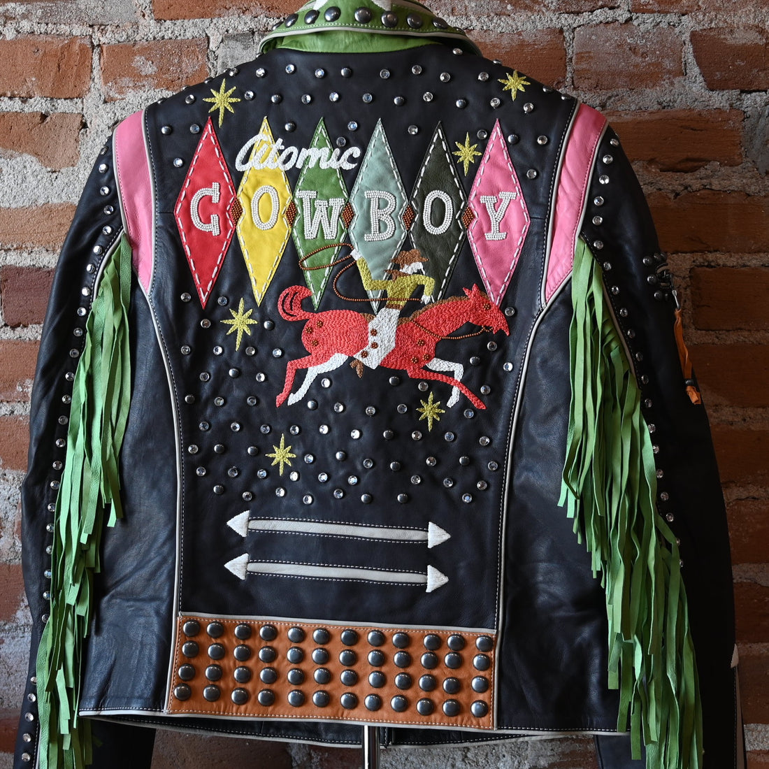 Double D Ranch Atomic Ranch bronco brown biker jacket with fringe, studs, crystals, and starburst embroidery