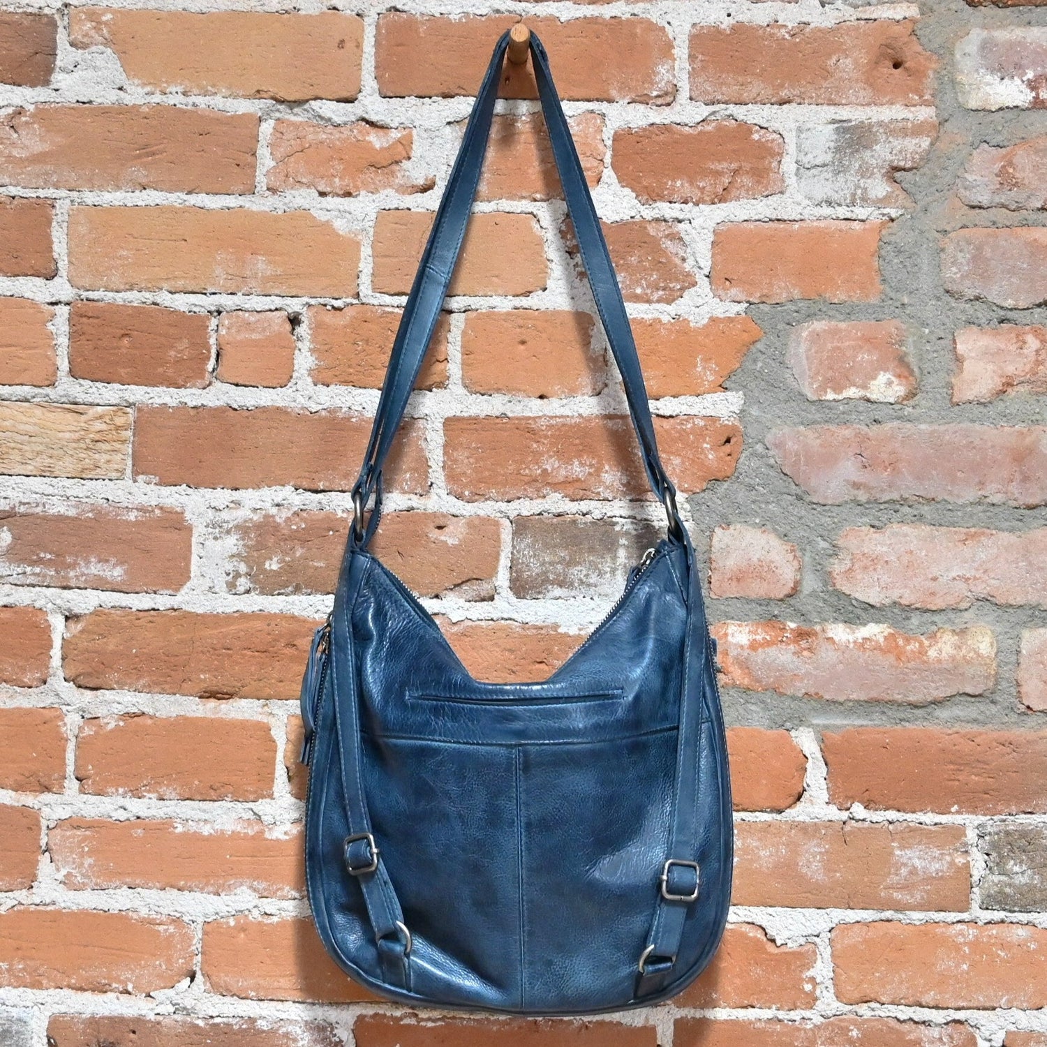 Latico Conley Backpack/Crossbody in Denium view of bag hanging