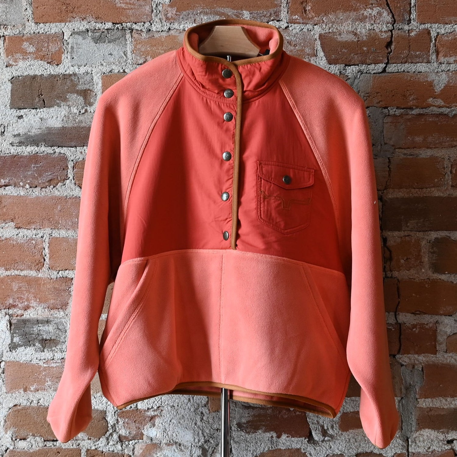 Kimes Ranch Ladies Josie Pullover in muted red fleece with front pocket and stitched longhorn logo