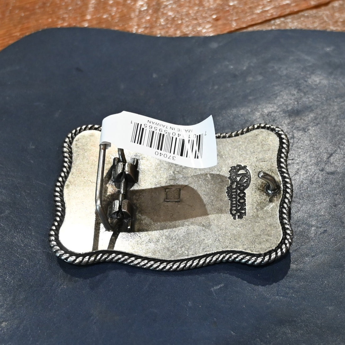 Nocona rectangle USA Flag belt buckle with rope edge border and red, white, and blue design