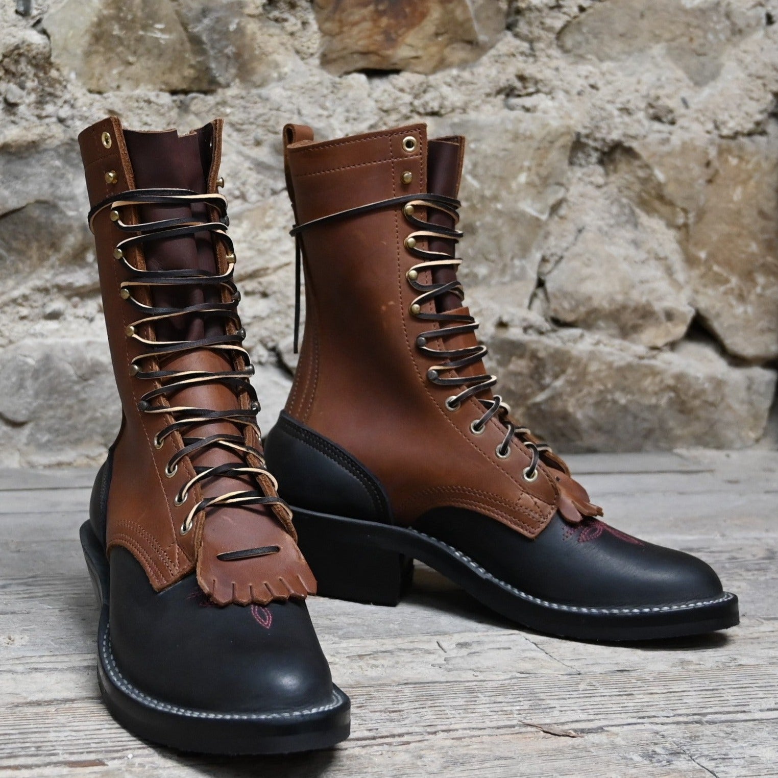 Two fashion tone leather boots