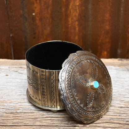 View of round box with turquoise lid