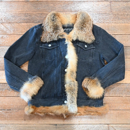 Black denim jacket with red fox fur trim on collar, cuffs, and front placket