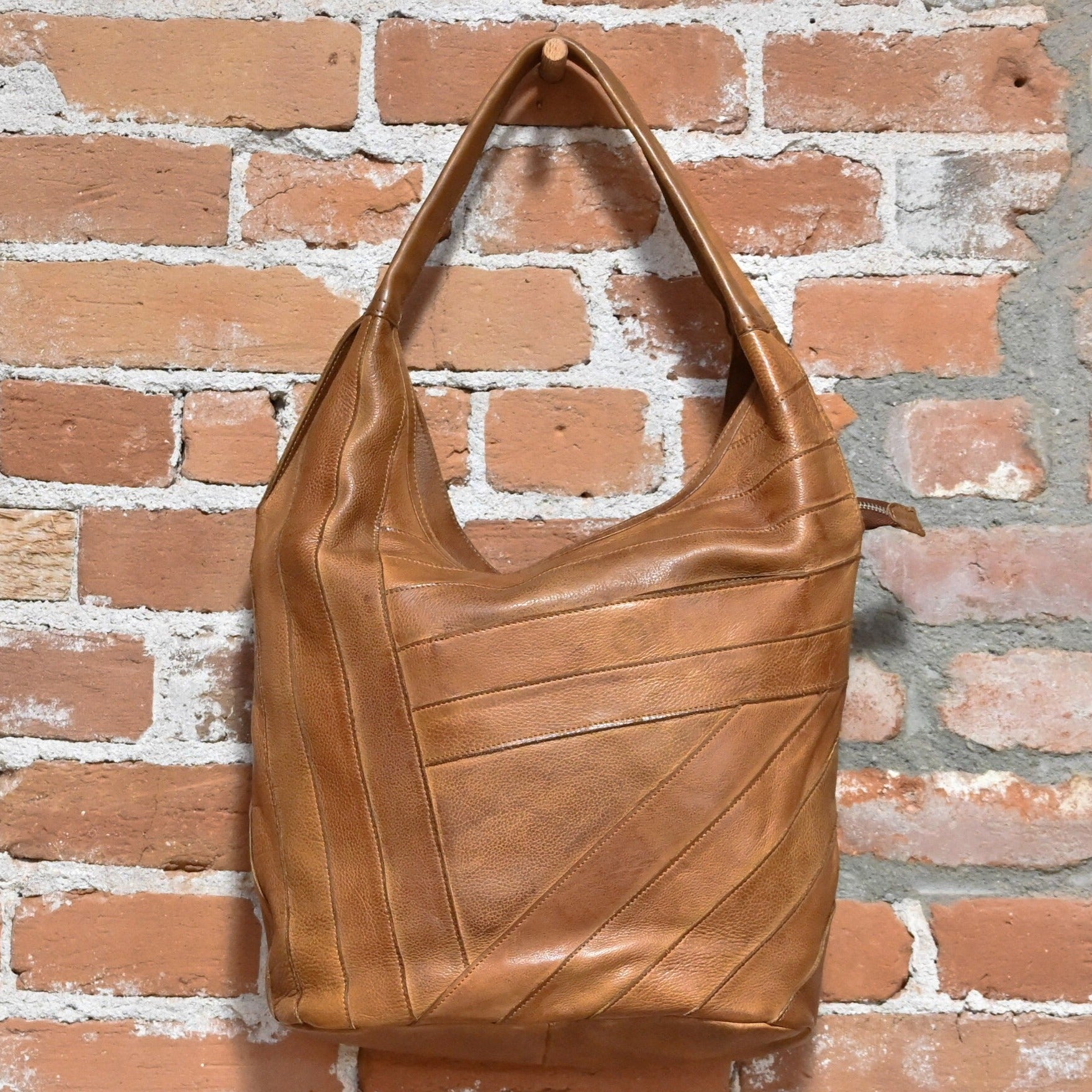 Latico Kiki Shoulder Bag in Cognac view of front hanging