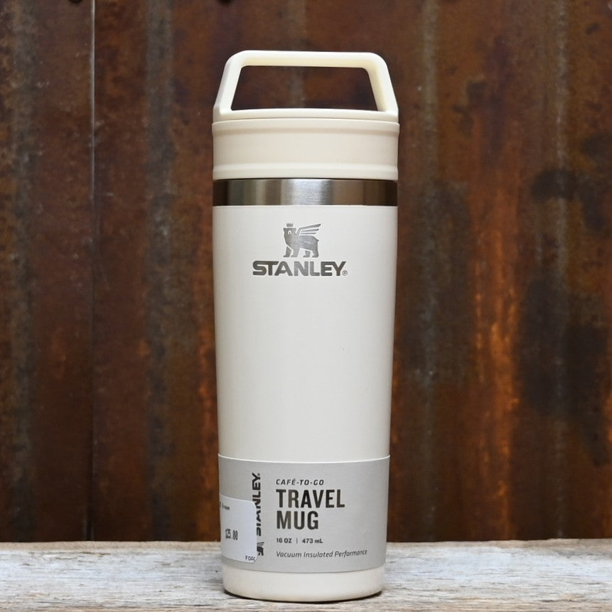 Stanley cream gloss 16 oz travel mug with integrated handle and two‑piece sip lid.