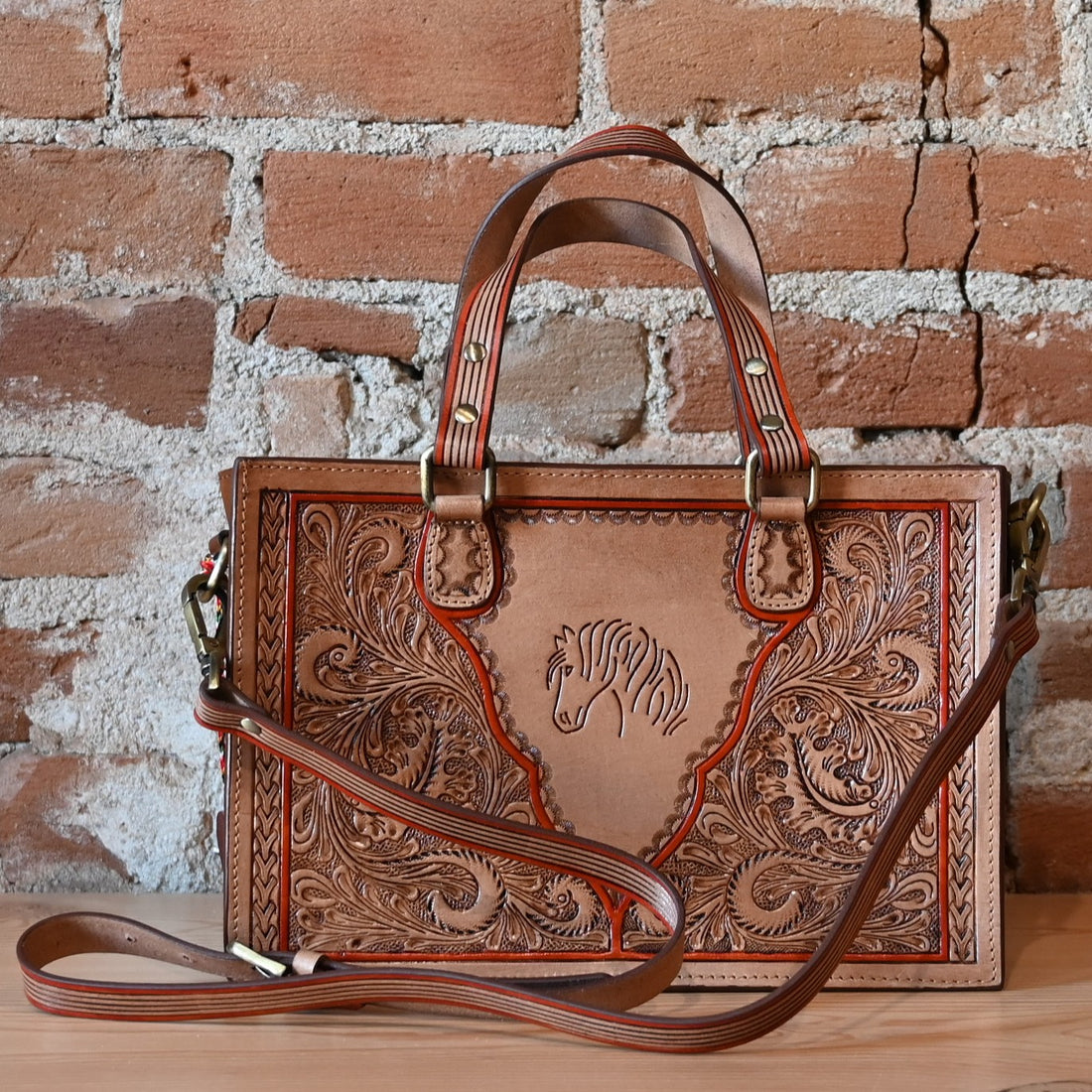 Myra Savanna Ember handtooled concealed carry bag in caramel leather
