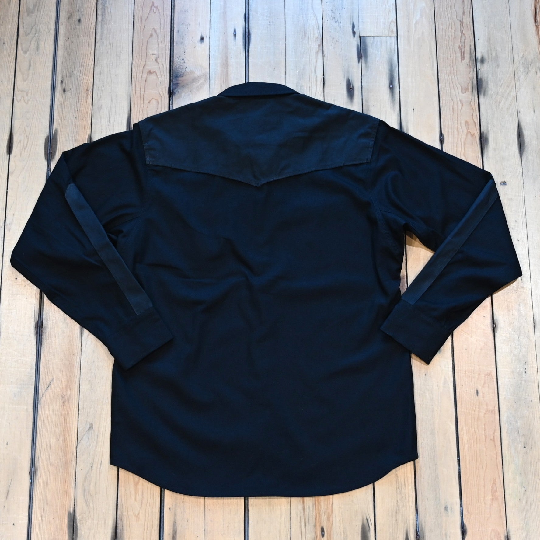 Filson × Wrangler Adventure Shirt in black with canvas overlays and snap pockets