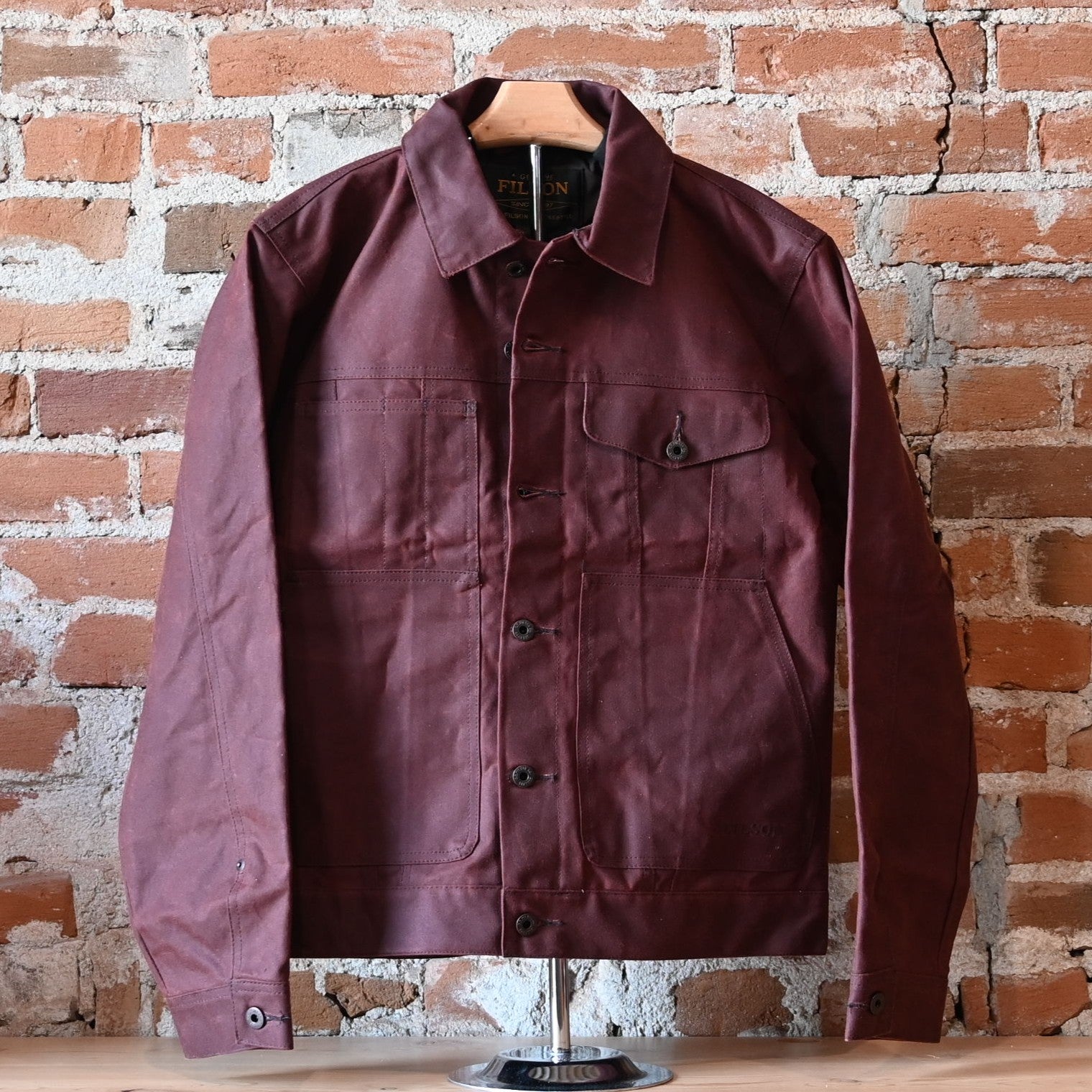 Filson Tin Cloth Short Lined Cruiser Jacket in Fired Brick with metal buttons and utility pockets