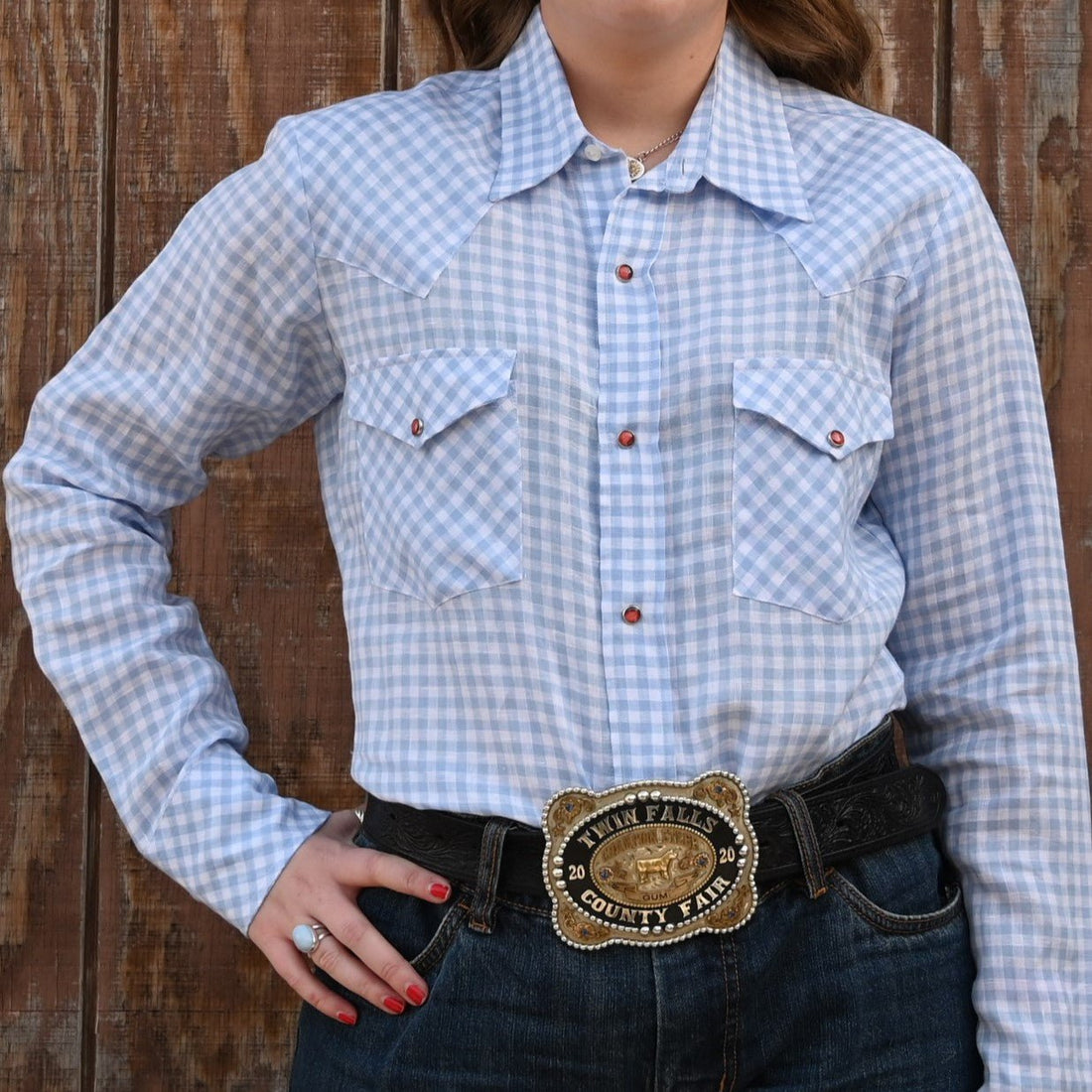 Blue Blanket Ladies Light Blue Plaid Western Shirt in 100% Linen with Orange Pearl Snaps view of front