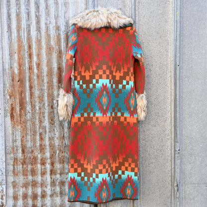 Tasha Polizzi Casey Coat in geometric orange, red, turquoise, and brown wool with removable faux fur collar and cuffs