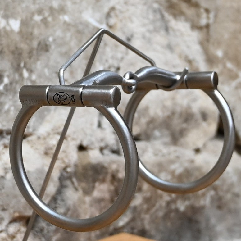 Tom Balding Baseline D‑Ring snaffle bit with satin rings and sweet iron mouthpiece.
