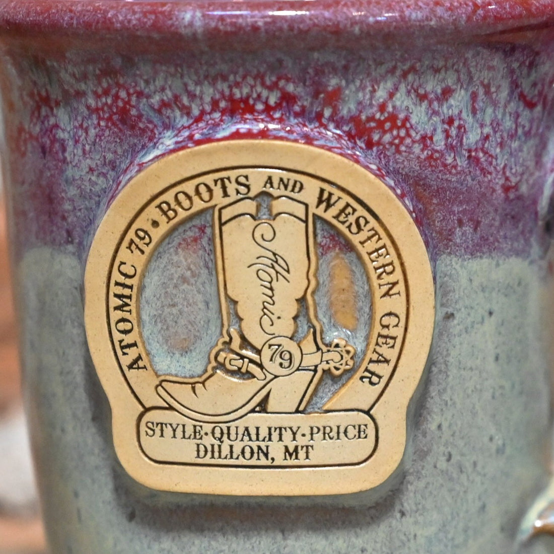 Morning Rambler Mug with Teal Magnolia Glaze And Atomic 79 Logo close up view