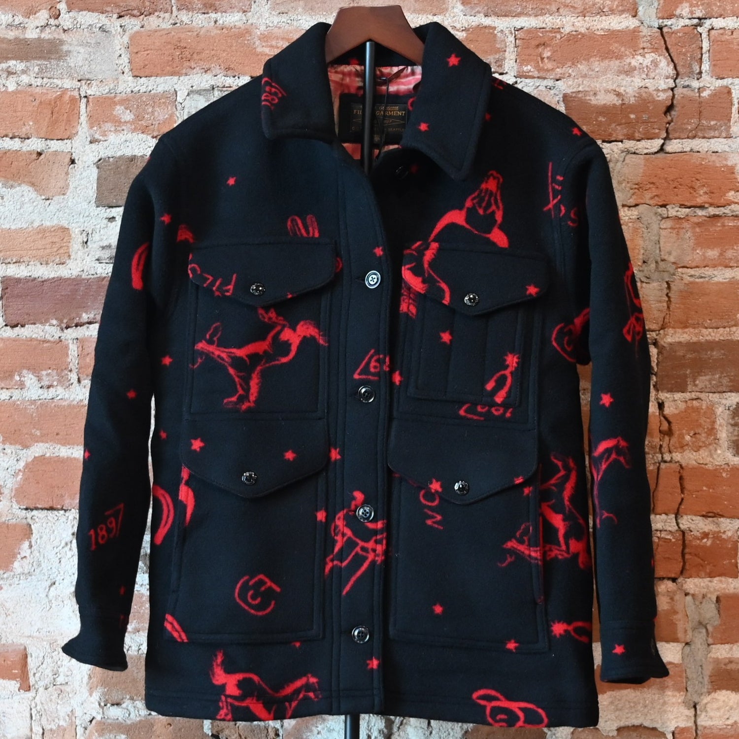 Filson Ladies Jacquard Wool Cruiser Jacket in Black and Red Western pattern with button front and utility pockets